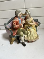 VINTAGE CUCCI ROYAL CROWN, COURTING VICTORIAN COUPLE SEATED ON COUCH picture