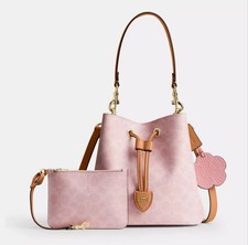 NWT Coach CEA23 Rowan Bucket Bag In Signature Canvas With Charms Powder Pink picture
