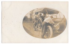 RPPC Early Auto Repair - Man Under Hood - Ladies in Hats, c1910 Postcard picture
