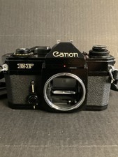 VINTAGE CANON EF 35mm CAMERA SLR  W/ STRAP. BODY ONLY. SHUTTER WORKS. GOOD COND picture