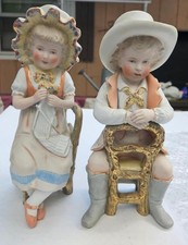 Vintage/Antique German Bisque Porcelain piano baby  Figurines. picture