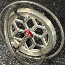 Vintage Metal Gyroscope Toy Mid Century Science Physics Starburst Silver Red picture