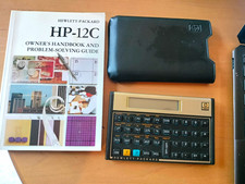 Hewlett-Packard HP-12C Financial Calculator w/ Case & Handbook, Batteries Incld picture