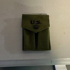 At the front reproduction WWII U.S. (JQMD 1943) OD green color picture