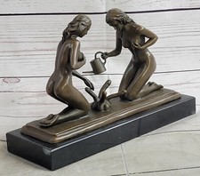 Exquisite Bronze Art: Sensual Naked Woman Gardener Watering Erotic Plant Statue picture