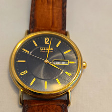 Citizen Eco-Drive Men's Gold-Tone Watch Black Dial Day/Date Brown Leather picture