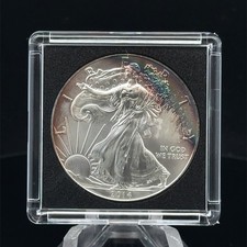 2014 American Silver Eagle 1 oz .999 Fine Silver Coin Uncirculated Rainbow toned picture