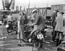 Louie McLean�s James motorcycle is refuelled at Southampton Docks - Old Photo picture