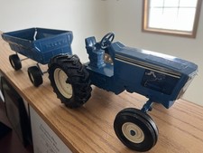 Vintage ERTL Toy Tractor W/ Blue Trailer picture