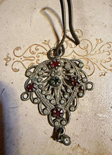 This piece is an authentic vintage Kuchi tribal Tikka (forehead/hair ornament) picture
