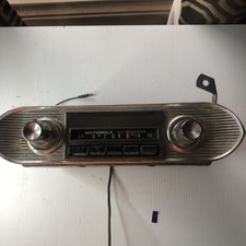Vintage 1962-66 Chevy Motorola CYA64 AM Radio - Golden Transistor with Bezel picture