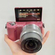 Sony a5000 Pink Mirrorless Camera + 16-50mm Silver Lens - 20.1MP Wi-Fi NFC. picture