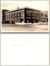 RPPC Brick Commercial Building Cars Street Corner Wires Photo Postcard picture