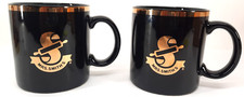 Set Of 2 Mrs. Smith's Bakery Black & Gold Logo Coffee Mugs In A Class By Itself picture