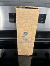 GE WH11X34741 OEM Genuine Washer Drain Pump Coin Trap Filter Fast Shipping NEW picture