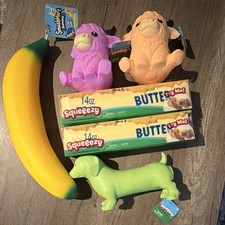 New Squeeezy Squeeze Lot SmushMart Banana Butter Sticks Purple Peach Cows Dog picture