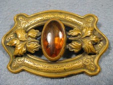 antique Art Nouveau or Victorian brass and glass cabochon sash pin picture