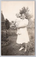 Vintage RPPC Woman Holding Child Garden Scene Defender Photo Post Card 1940s 50s picture