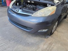 Used Front Bumper Assembly Front fits: 2006 Toyota Sienna w/fog lamps w/o adapti picture