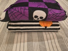 Purple & Black Checkered Skull Spiderweb Halloween Throw Blanket, Striped Edge picture