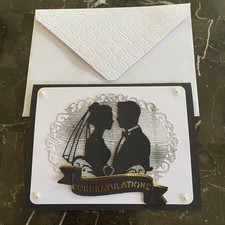 handmade Embossed Wedding day card with gold foil accents, paper cut outs picture