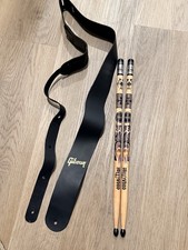BLACK LEATHER GIBSON GUITAR STRAP WITH HARD ROCK CAFE HOLLYWOOD DRUMSTICKS picture