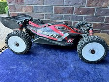 ARRMA Typhon 6S BLX 1/8 4WD Brushless RC Buggy Spektrum RTR Transmitter picture