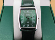Vintage Seiko Slim Quartz Men's Wrist Watch green Dial with Green Strap. picture