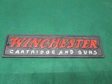 Cast Iron WINCHESTER Cartridge and Guns Plaque Sign Rustic Ranch Wall Decor   picture