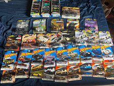 Hotwheels/matchbox lot of 38 unopened regular/premium sets picture