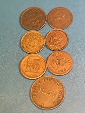 old US token coins lot of 7 coin tokens picture