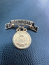 Vintage FENDI Logo Coin Medallion Charm Brooch Gold Tone Black Enamel Ribbon picture