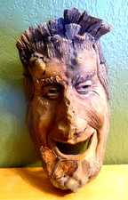 HAND CRAFTED HEAVY CLAY LAUGHING GARDEN SPIRIT MASK WITH BUTTERFLY ON HIS CHIN picture
