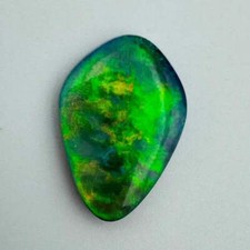 5.7ct Mintabie Semi Black Green Flash Opal picture