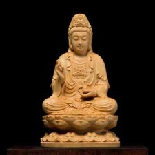 Kuan Yin Figurine Seated on Floral Base: Handcrafted Wooden Buddha Sculpture picture