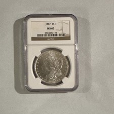 1187 MS63 Morgan Silver Dollar. NGC Graded picture