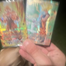 Difference Of Status Bt14-029 Sr And Ferocious Strike As Son Goku Bt10-060 Uc picture
