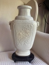 A LARGE ANTIQUE CHINESE MOULDED WHITE-GLAZED SQUARE FLORAL AND DRAGON VASE picture