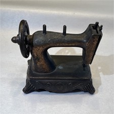 Vintange Durham Industries Inc. Cast Iron Mini Toy Sewing Machine. picture