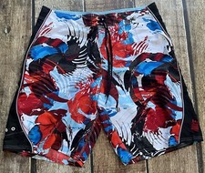 VINTAGE NIKE SWIM FLORAL BOARD SHORTS RED WHITE BLUE MENS 36 EXELLENT CONDITION picture