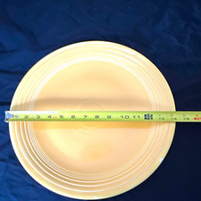 Yellow vintage unmarked Fiesta Ceramic Glossy charger/chop 14 1/2 in picture