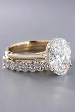 IGI 5.10Ct Oval-Cut EF/VS1 Lab Grown Diamond Engagement Ring Set 14k Yellow Gold picture