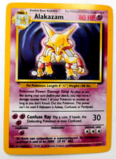 1999 POKEMON HOLOFOIL ALAKAZAM 1/102 #65BASE SET WOTC TCG  HOLOGRAM CARD NM/MINT picture