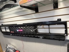 Nissan 720 Generic Custom Front Grill with Nissan LED Light and 4x4 Batch Kit 2 picture