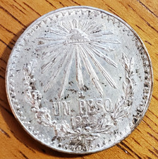 MEXICO 1934 1 PESO .720 SILVER picture