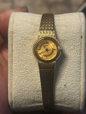 RARE Vintage Seiko gold tone woman’s watch with matching woven strap picture