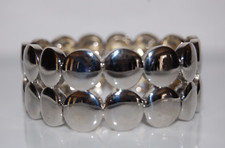 ELEGANT SILVER TONED METAL CIRCLE DESIGN MODERN STYLE STATEMENT STRETCH BRACELET picture
