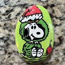 hand painted rocks .. Snoopy as The Grinch  picture