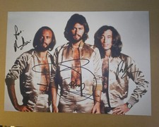 W/COA, ORIGINAL BEE GEES  AUTOGRAPHS 12X8.5