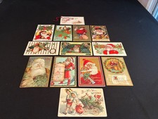 Lot of 13~Antique~SANTA CLAUS~Christmas Clapsaddle New Year Postcards picture